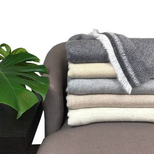a collection of cashmere throws, herringbone cashmere throws  sabrina bitton designer toronto features her own on line store-shopsabrinabitton.com