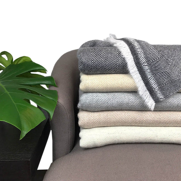 a collection of cashmere throws, herringbone cashmere throws  sabrina bitton designer toronto features her own on line store-shopsabrinabitton.com